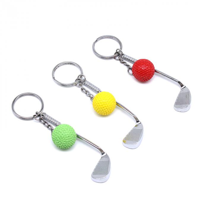 3d金属の卸売のかわいいゴルフ・ボールの注文のkeychainを魅了する