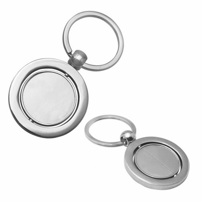 注文の昇進の回転空白の金属車のキーホルダーは丸型亜鉛合金のkeychainをカスタマイズした